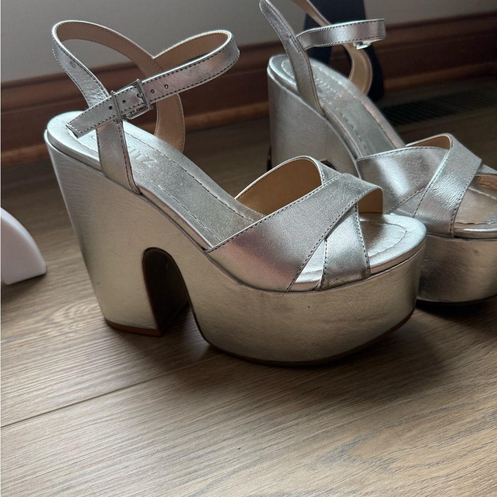 SCHUTZ Silver Platform Shoes with Retro-Inspired Design